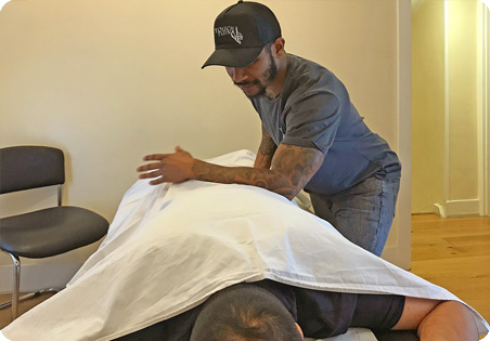 Adrian Skervin performing a Touch Tuina treatment at the Kentish Town clinic