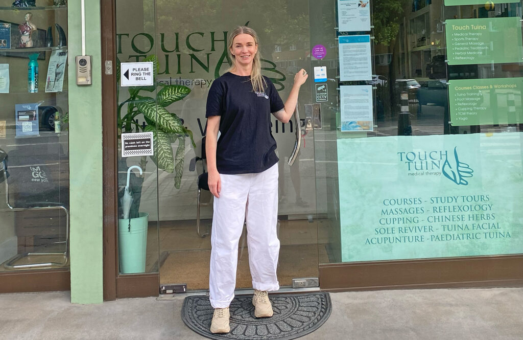 Touch Tuina Practitioner Margot standing outside the Kentish Town clinic